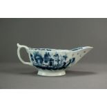 A rare Worcester porcelain sauce boat, circa 1765, painted in underglaze blue with the Mission