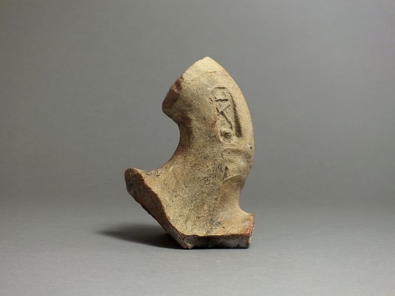 Greek, ceramic amphora handle with makers stamp to one side. 4th - 1st century BC