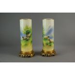 A pair of Royal Worcester bone china sleeve vases painted by Harry Davis painted with sheep