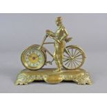 A novelty brass desk timepiece by The British United Clock Company. In the form of a gentleman