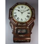 A mid to late 19th century inlaid rosewood drop dial clock with later movement and dial signed