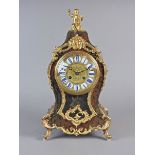 A Louis XV style scarlet boulle mantel clock, 19th century, the 5" dial with white and blue enamel