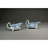 A rare pair of Bow three-legged sauceboats, circa 1752-54 painted in bright blue with flowering