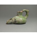 Byzantine, glazed ceramic oil lamp; 7th - 9th century AD; long rectangular nozzle with rounded body;
