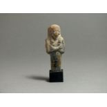 Egyptian ceramic New Kingdom, 1550 - 1077 BC; Shabti with mummiform body, arms crossed at chest,