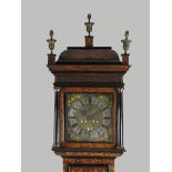 An early 18th century walnut and seaweed marquetry month duration longcase by Edmund Day, London,