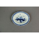 A Caughley toy meat plate, circa 1785, painted in blue with the Island pattern within a painted