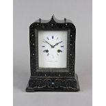 A French ebonised and brass strung mantel clock, 19th century, the 3.5 inch rectangular white enamel