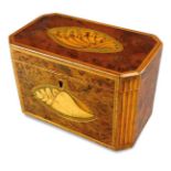 A George III boxwood and harewood inlaid two division tea caddy, the canted rectangular top inlaid