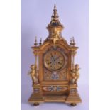 A FINE LARGE 19TH CENTURY FRENCH ORMOLU AND CHAMPLEVE ENAMEL MANTEL CLOCK modelled with numerous