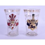 A PAIR OF 18TH CENTURY CONTINENTAL ENAMELLED GLASS BEAKERS painted with central crests. 11.5 cm