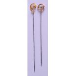 AN ART NOUVEAU 9CT GOLD HAIR PIN by Charles Horner, together with another similar gold pin. (2)