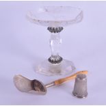 A VICTORIAN CARVED IVORY AND SILVER CADDY SPOON together with a venetian glass salt & a thimble. (