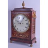 AN EARLY 19TH CENTURY ENGLISH MAHOGANY BRACKET CLOCK by Hewitt of London, inlaid in brass with