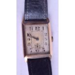 A VINTAGE 9CT GOLD GENTLEMANS WRISTWATCH with rectangular dial and black numerals. 19.5 grams