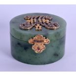 A RUSSIAN SILVER GILT DIAMOND AND NEPHRITE CIRCULAR BOX AND COVER decorated with a stylised