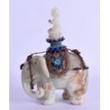 A GOOD EARLY 20TH CENTURY CHINESE SILVER GILT AND ENAMEL JADE ELEPHANT Qing, the top set with an