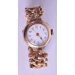 A VINTAGE 9CT GOLD LADIES WRISTWATCH with expanding 9ct gold strap. 27.4 grams overall. Dial 2.25 cm