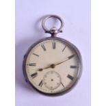 A VICTORIAN SILVER POCKET WATCH with white enamel dial. 5 cm diameter.