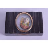 AN EARLY 19TH CENTURY CARVED TORTOISESHELL SNUFF BOX inset with a cameo carving of a male. 8.5 cm