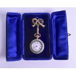 A LOVELY EARLY 20TH CENTURY CONTINENTAL SILVER AND ENAMEL HANGING FOB WATCH painted with two