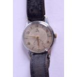 A VINTAGE WHITE METAL TUDOR WRISWATCH with silvered dial and brass numerals. 3.25 cm diameter.