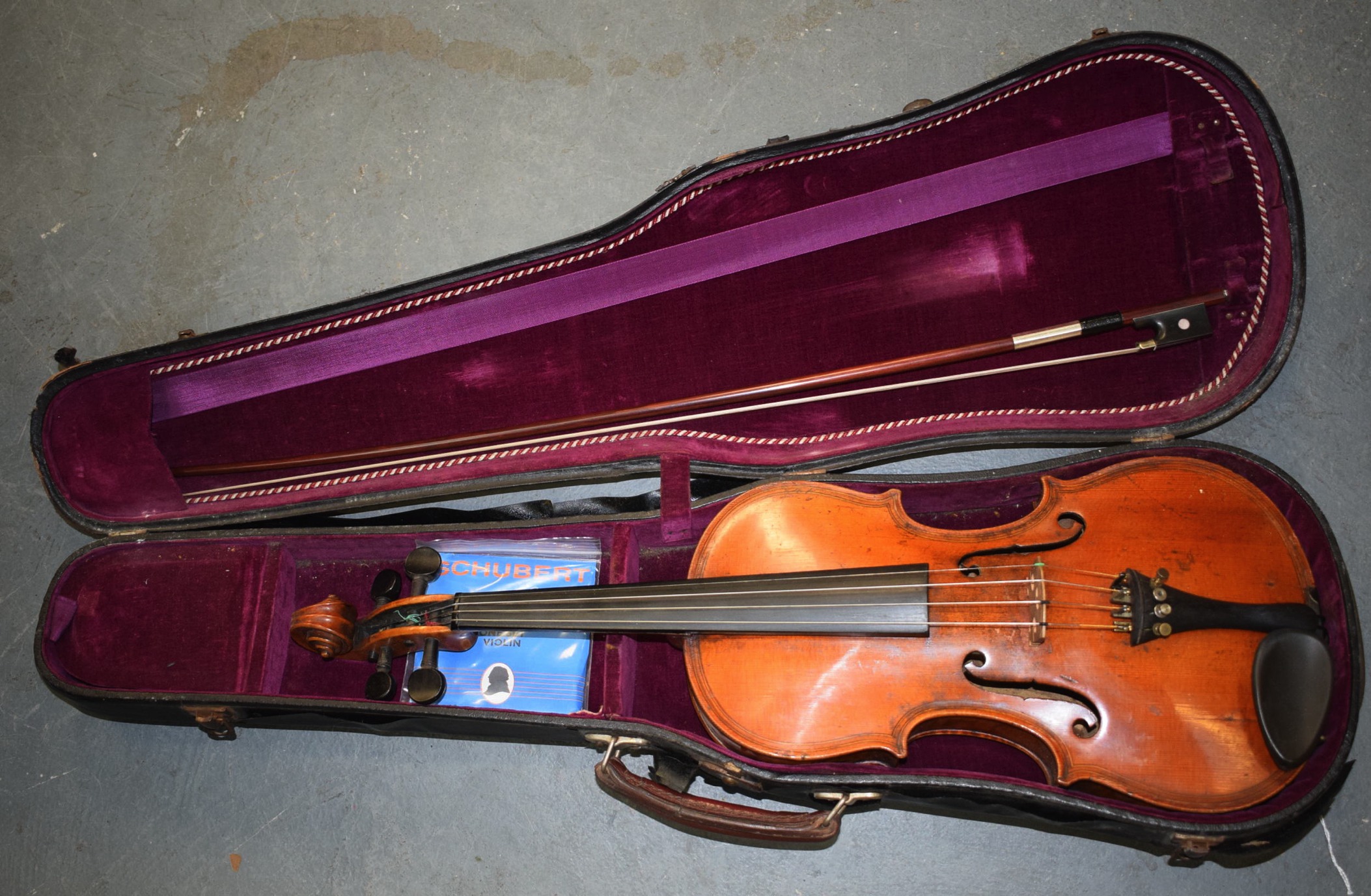 A GOOD ANTIQUE VIOLIN, bearing interior label "Gionvam Paulo Maggini, 1698", together with a bow.