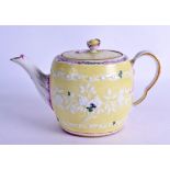 Worcester floral moulded teapot and cover with lemon coloured ground, the border with puce