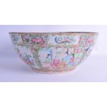 A LARGE 19TH CENTURY CHINESE FAMILLE ROSE CANTON BOWL painted with figures, landscapes and