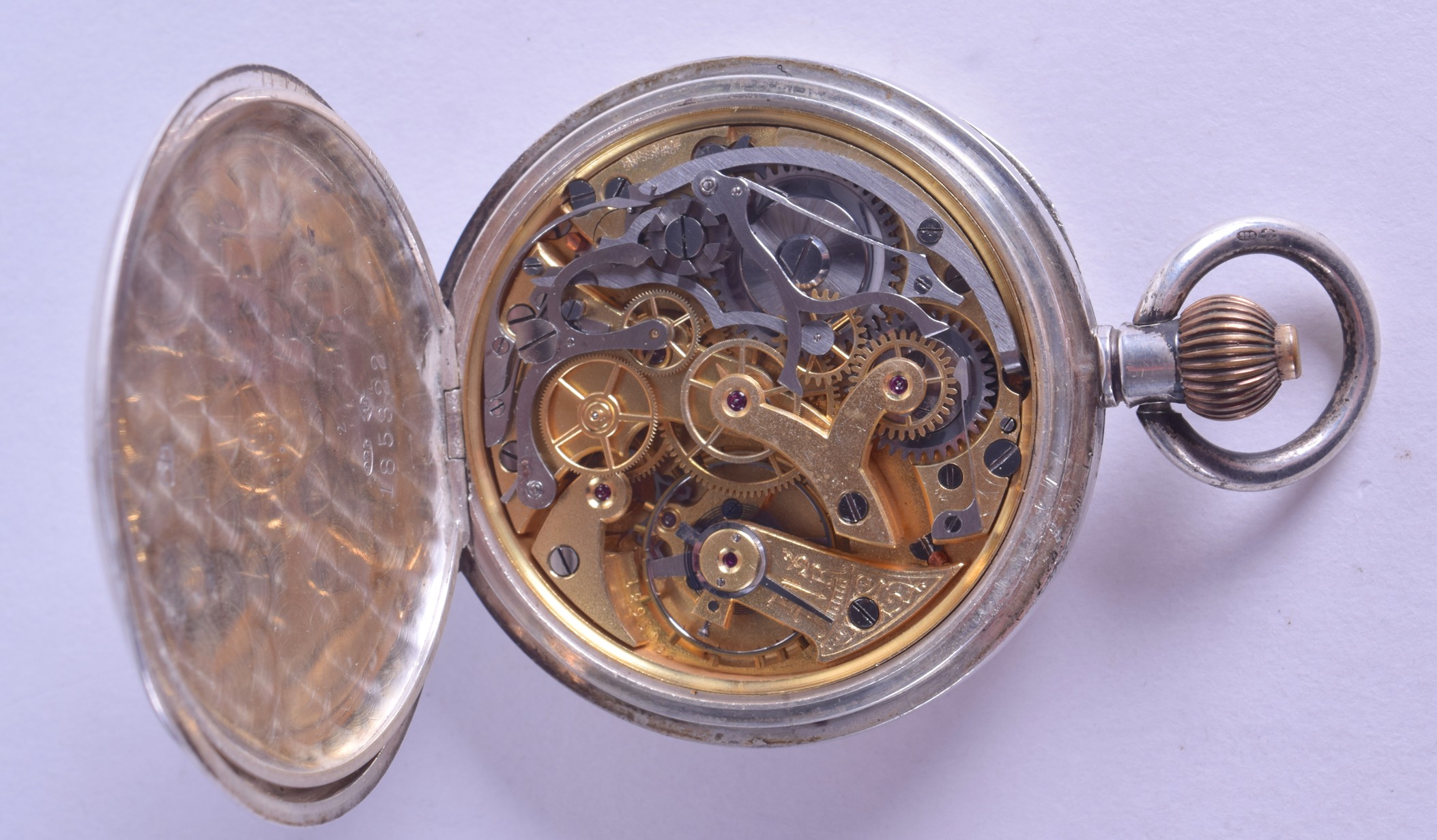 AN ANTIQUE CONTINENTAL SILVER CHONROMETER POCKET WATCH with white enamel dial and black numerals. - Image 2 of 3
