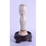 AN UNUSUAL CARVED BONE SCRIMSHAW PHRENOLOGY ACUPUNCTURE WALKING STICK HANDLE with engraved