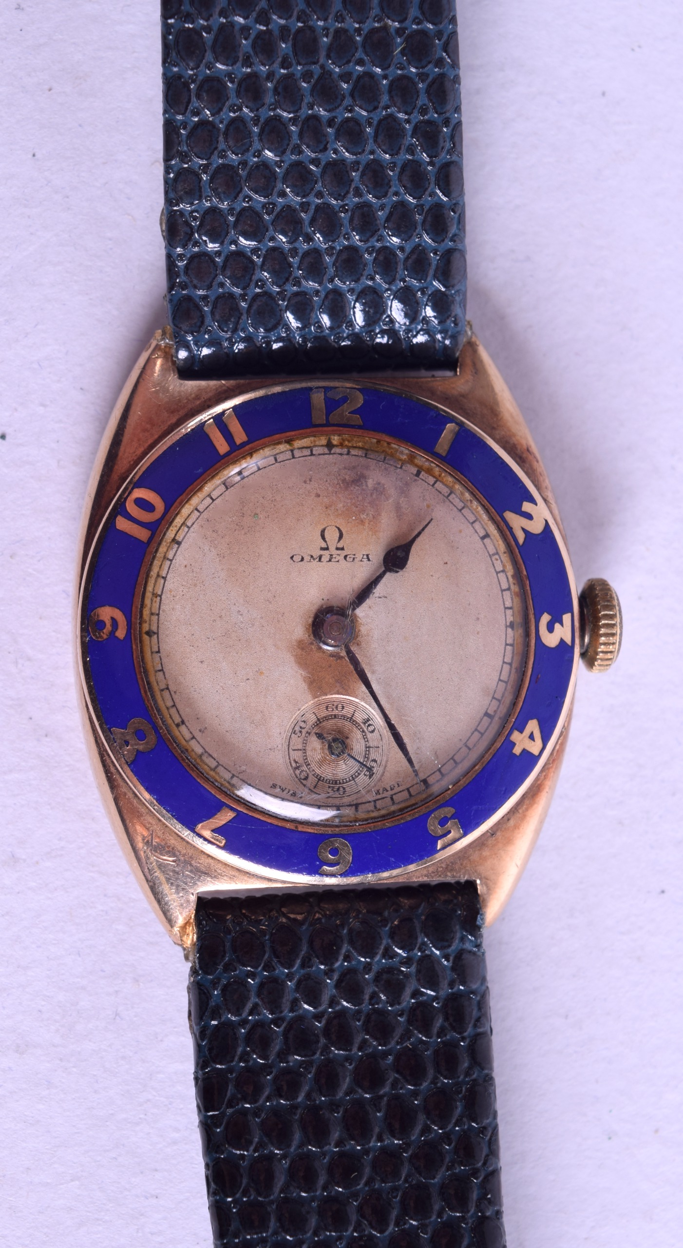A RARE VINTAGE 9CT GOLD AND ENAMEL OMEGA WRISTWATCH with highly unusual blue enamelled decoration to