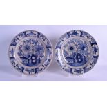 A PAIR OF 18TH/19TH CENTURY DUTCH DELFT BLUE AND WHITE DISHES painted with landscapes. 23 cm