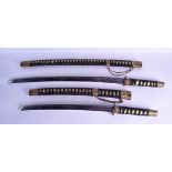 TWO SAMURAI SWORDS 20th Century. 95 cm & 78 cm long. (2)