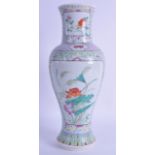 A 19TH CENTURY CHINESE FAMILLE ROSE BALUSTER VASE Guangxu, painted with extensive foliage and vines.