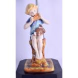 A ROYAL WORCESTER FIGURE OF PETER PAN converted to a lamp. Figure 21 cm high.