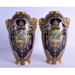 19th c. Coalport superb pair of jewelled vases painted with a gilt panel of flowers, green mark.