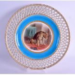 Late 19th c. Minton plate painted with a hound dog under a turquoise and pierced border by Henry