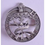 A LOVELY ANTIQUE SILVER BROOCH set with a serpent wrapped around three arrows. 5.75 cm diameter.