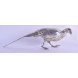 A GOOD ENGLISH SILVER FIGURE OF A ROAMING PHEASANT naturalistically modelled. 8.5 oz. 27.5 cm wide.
