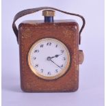 AN UNUSUAL ANTIQUE LEATHER CASED TRAVELLING REAPEATING CLOCK with circular enamel dial and black