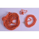 AN ANTIQUE CARVED RED CORAL BEAD NECKLACE together with another necklace. 35 grams. 80 cm & 44 cm