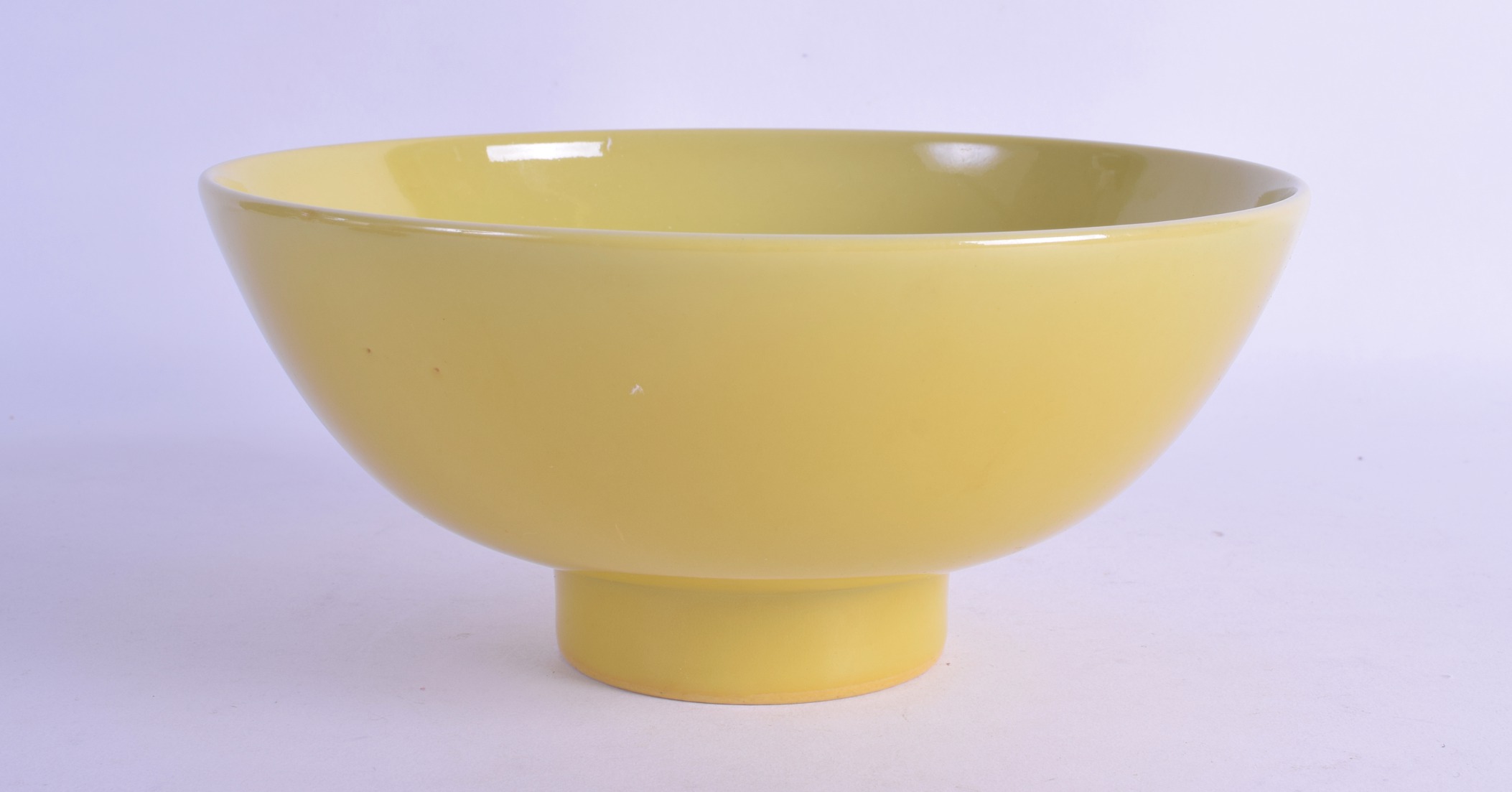 A CHINESE IMPERIAL YELLOW PEDESTAL FOOTED BOWL probably Qing, bearing Jiajing marks to base. 19 cm x