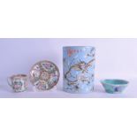 AN EARLY 20TH CENTURY CHINESE CANTON FAMILLE ROSE TEACUP AND SAUCER together with a lobed dish and