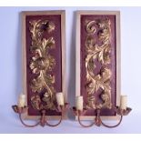 A PAIR OF 18TH CENTURY CONTINENTAL CARVED WOODEN PANELS converted to wall sconces. 21 cm x 51 cm.