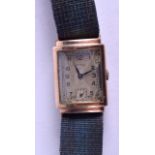 A 1950S 9CT GOLD ROLEX STYLE WRISTWATCH with rectangular dial. Overall 20 grams. Dial 2 cm x 2.5