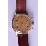 A VINTAGE BREITLING YELLOW METAL AND STAINLESS STEEL CHRONOMETER WRISTWATCH with gilt dial and