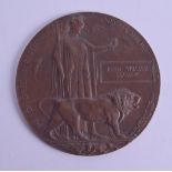 A MILITARY DEATH PLAQUE presented to John William Ewbank. 12 cm diameter.