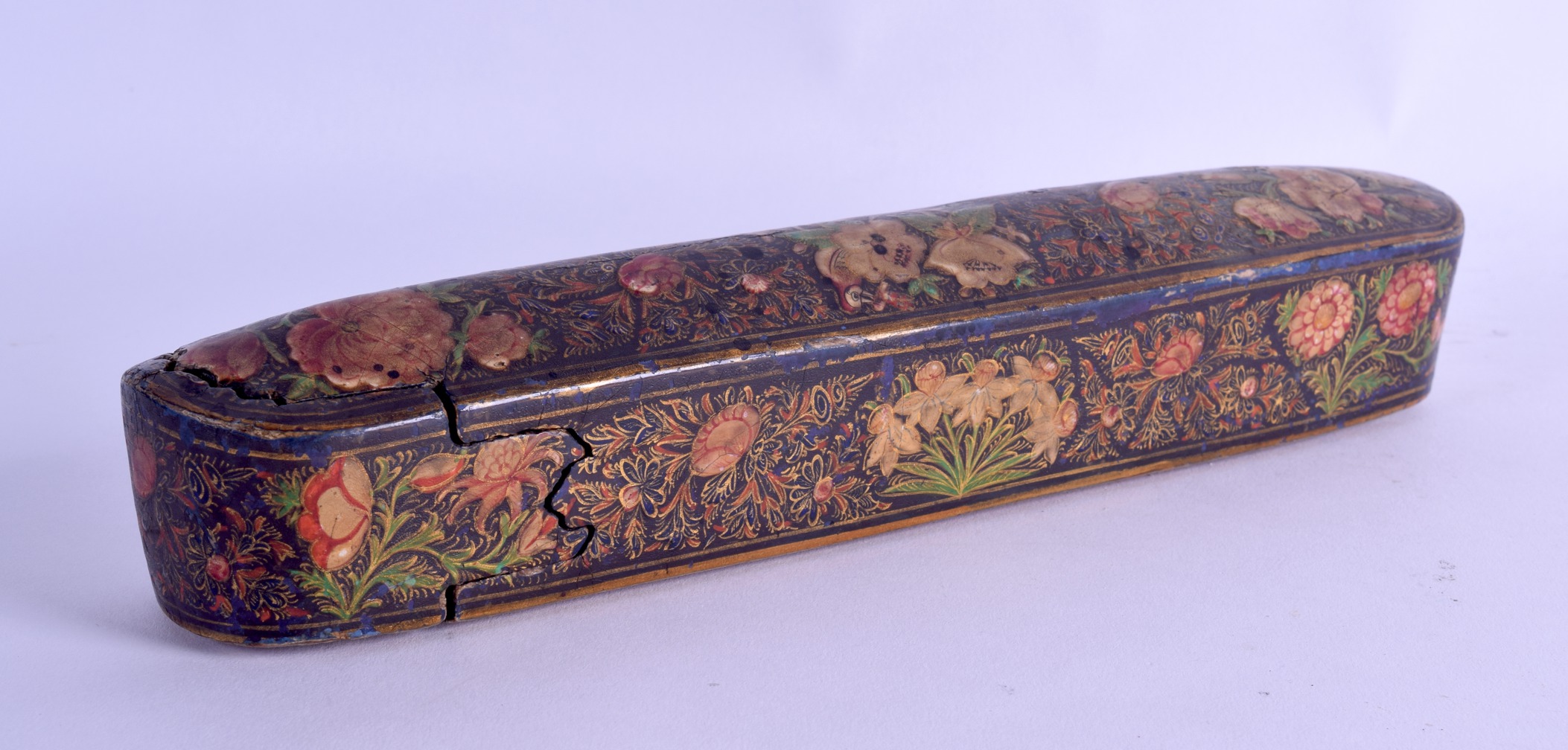 A GOOD 18TH/19TH CENTURY PERSIAN LACQUERED QUAJAR SLIDING PEN BOX painted with extensive foliage and