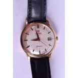 AN 18CT GOLD OMEGA AUTOMATIC GENEVE WRISTWATCH with silvered dial and black numerals. Overall 40